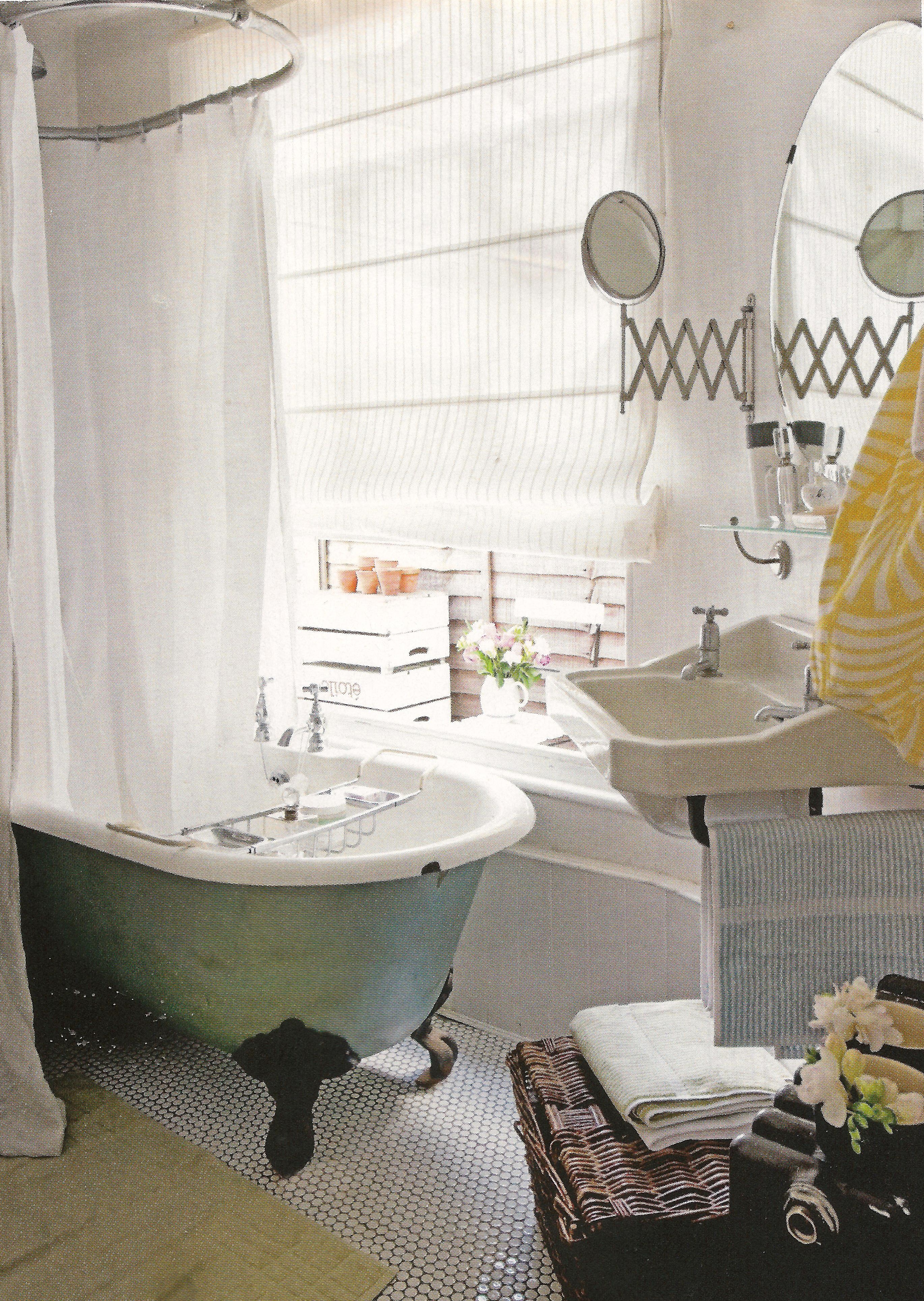 Vintage bathroom with artistic floor tiles and vintage bathtub ...