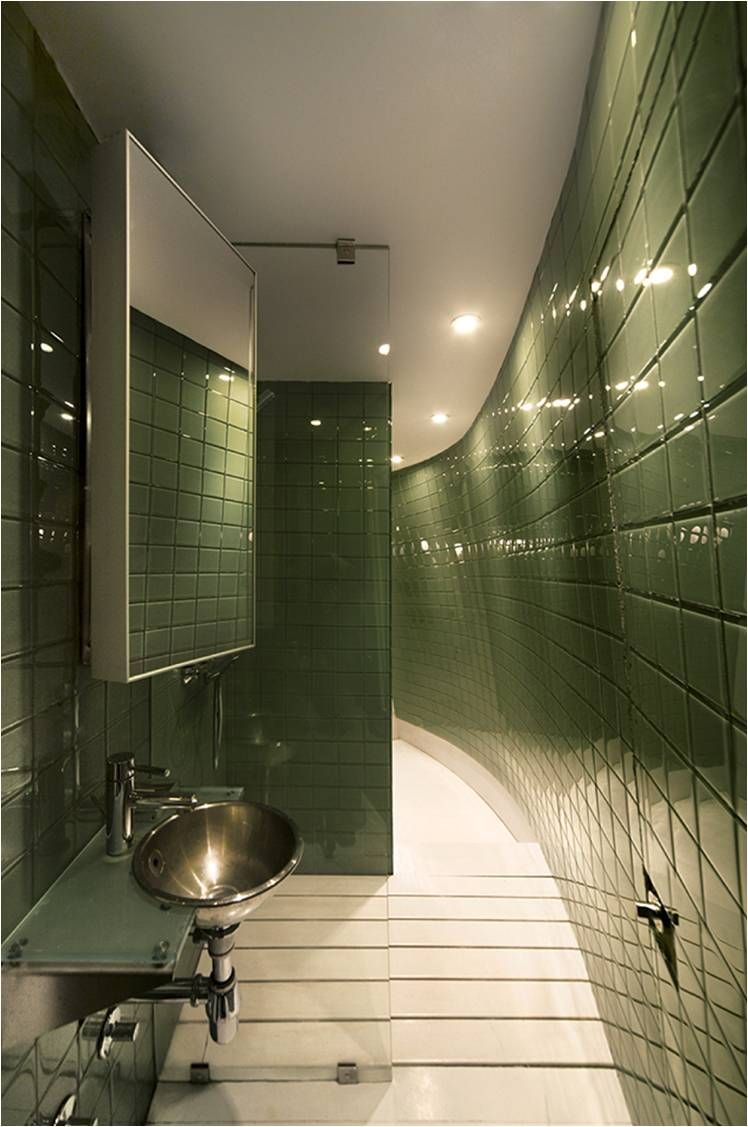 minimalist-bathroom-interior-in-green-tile-ceramics