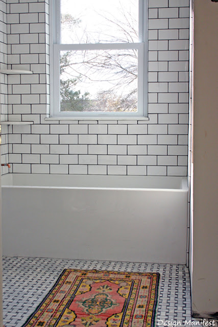 bathroom+tiled+with+rug+design+manifest1