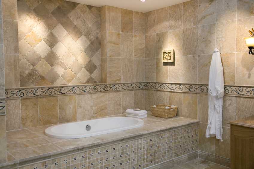 Luxurious modern bathroom with bathtub and hanging bathrobe