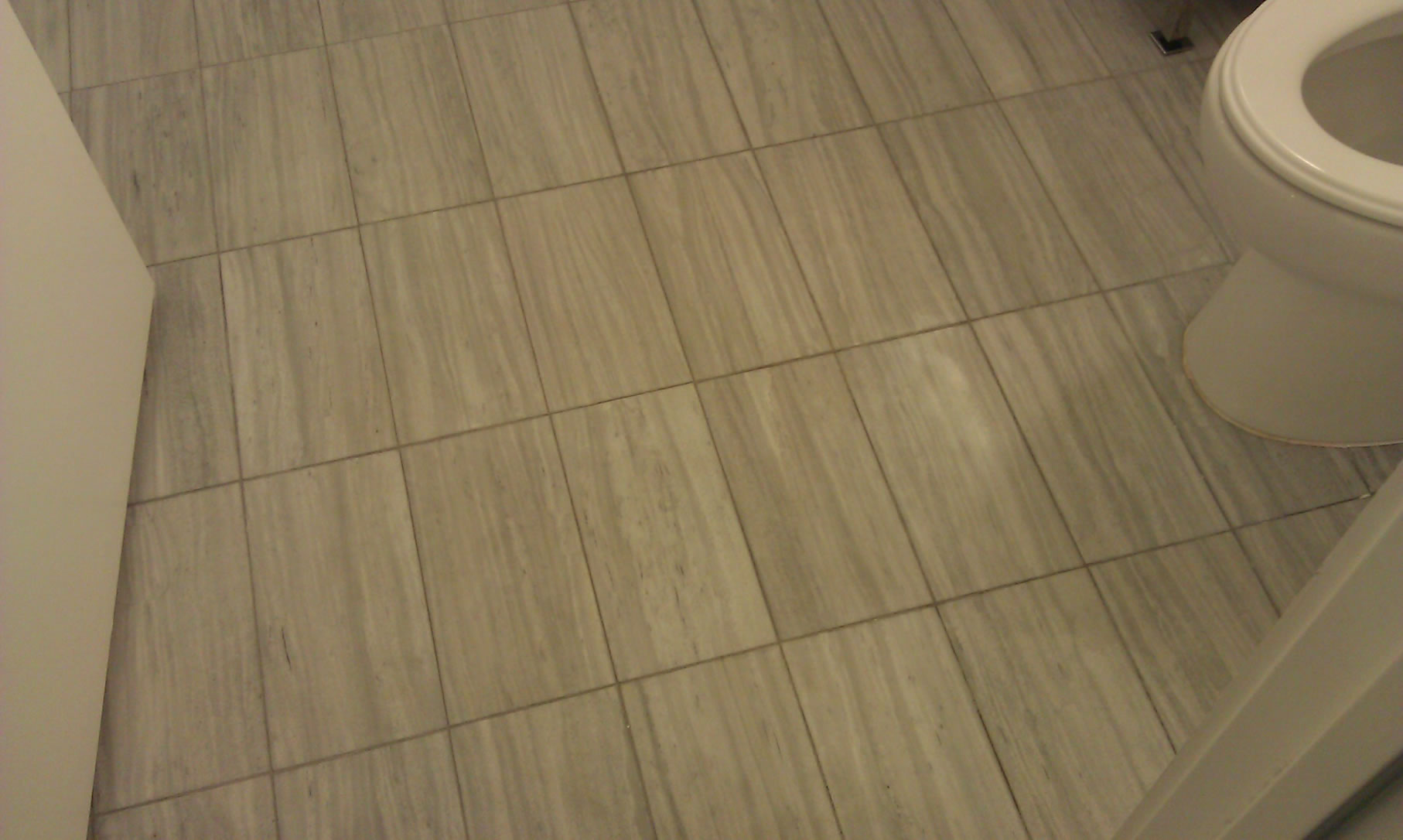 tiled-floor-bathroom-before