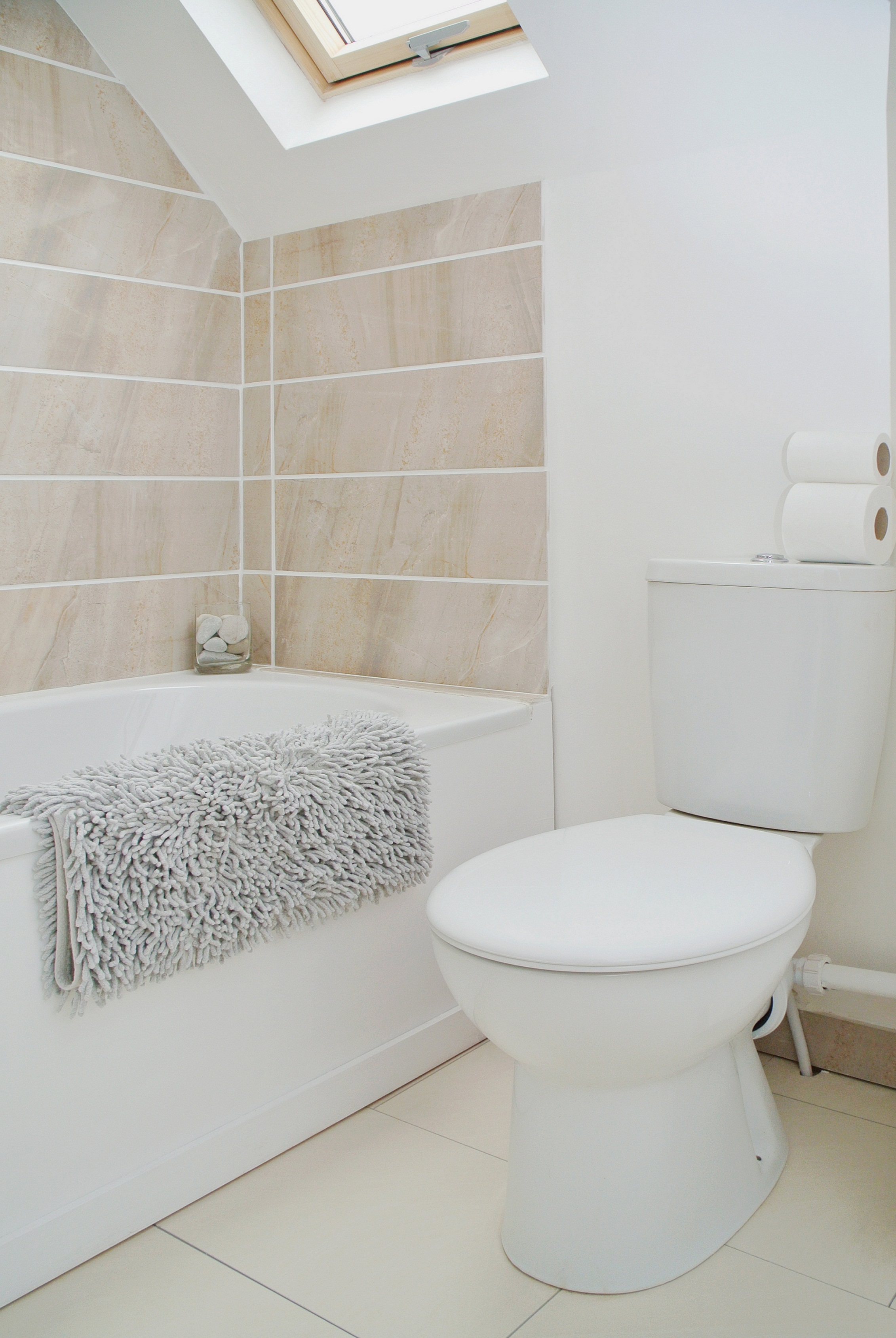 a modern bathroom in a newly converted rebuilt house