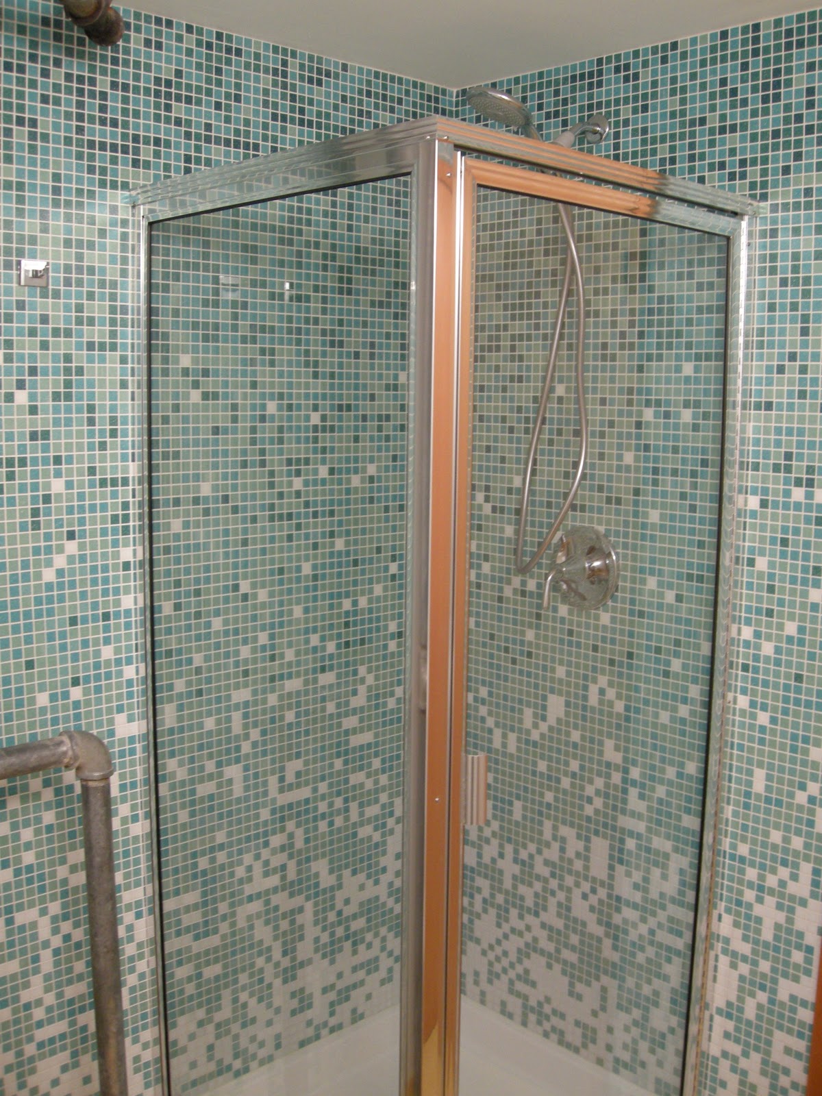 bathroom-inspiration-cool-blue-mosaic-wall-tiled-in-modern-small-space-bathroom-decors-with-amazing-showers-wall-as-well-as-glass-shower-cubicle-ideas-amazing-showers-and-tubs-astonishing-ideas-and-a