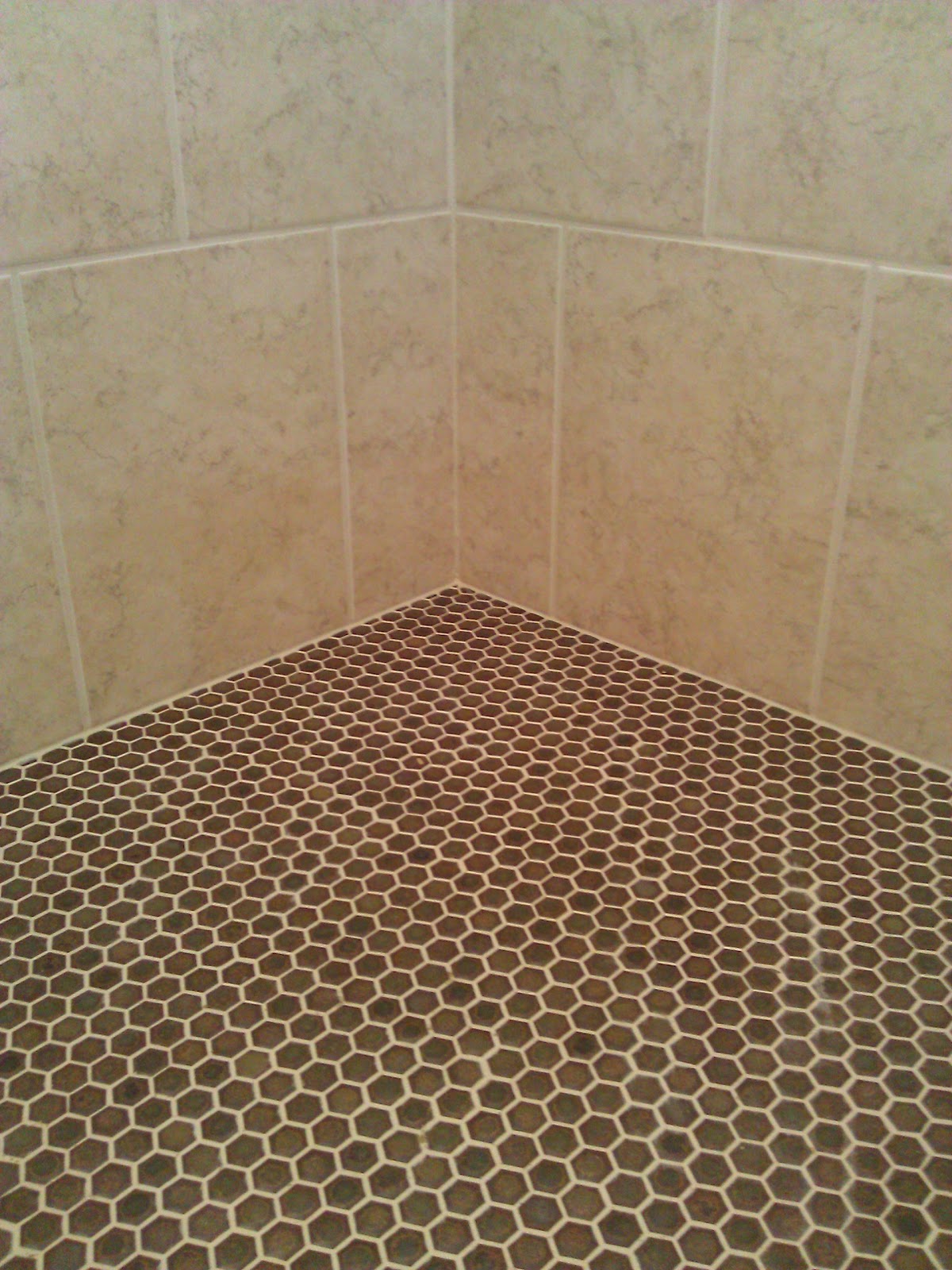 copper hexagon tile shower