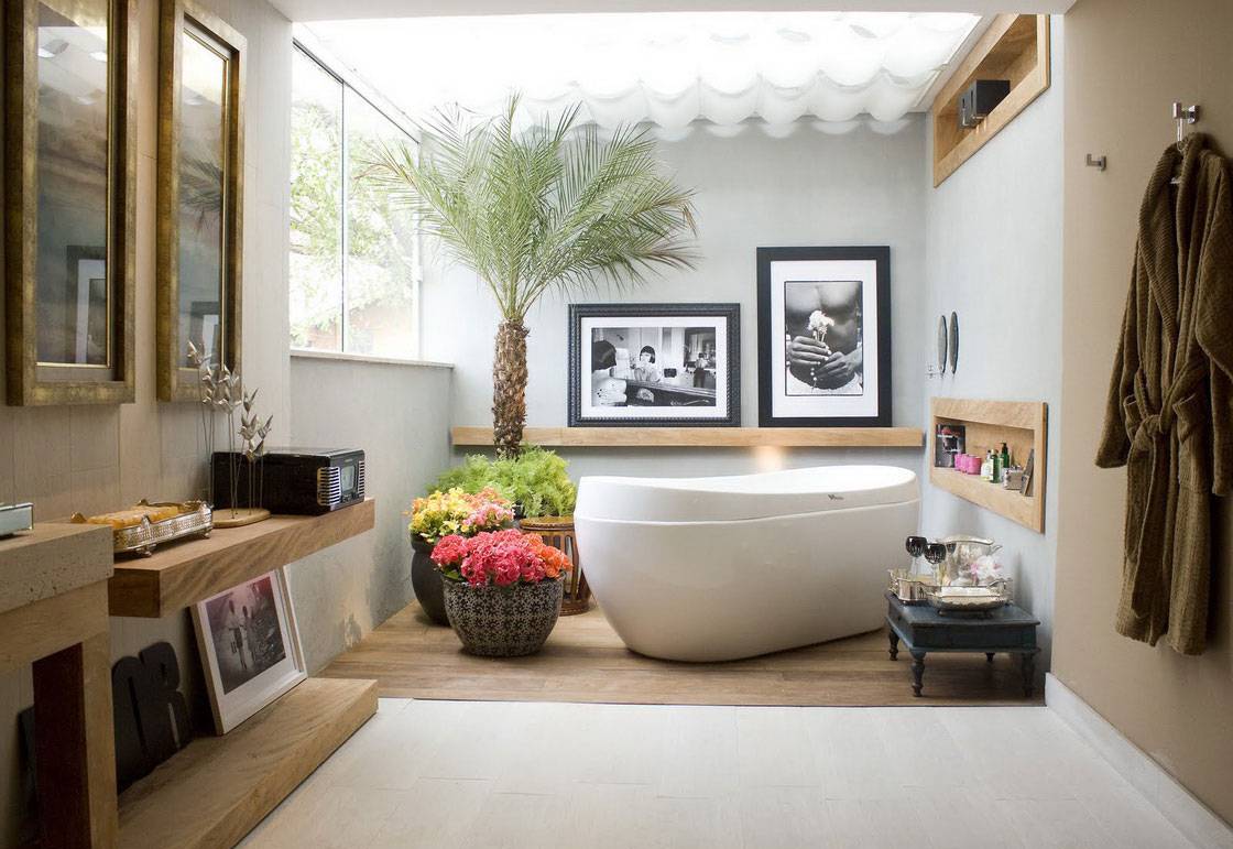 interior-bathroom-design-with-glass-roof-over-free-standing-tub-and-built-in-shelves-with-open-shelf-with-min-palm-tree-and-flower-pots