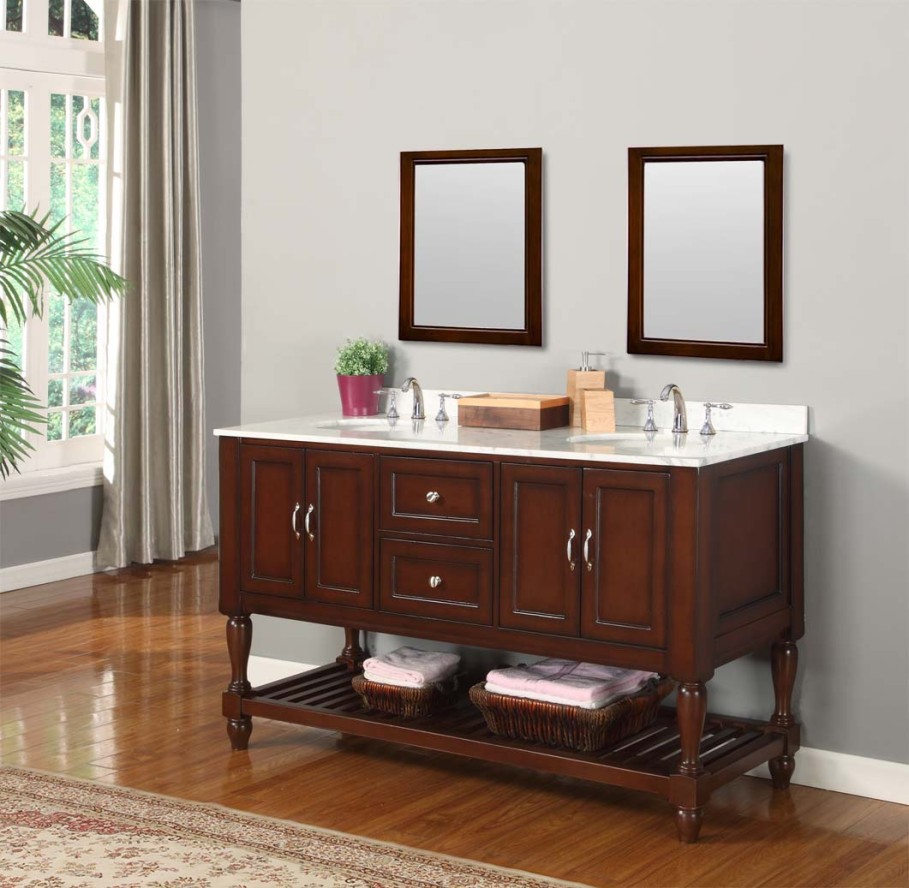 traditional-bathroom-vanities-with-tops-design-on-white-marble-material-below-double-mirrors-909x888