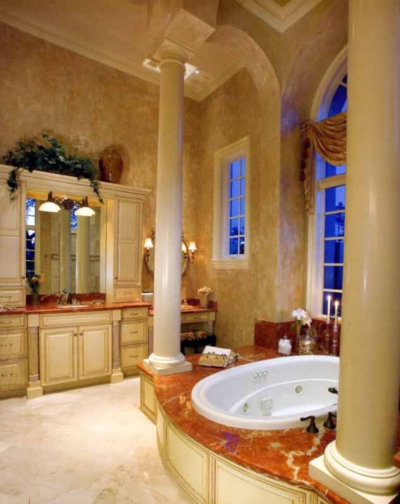 MaterialsTuscan style bathroom remodeling calls for natural stone, wood, and wrought iron.Marble or slate can be used on the floor and vanity top.A Tuscan bathroom often has eye-catching architectural elements such as arched window frames, niches, tall windows, skylights or columns.Then there is the glossier Tuscan look, which might feature terracotta tile floors, mottled marble finishes and designer hardware on drawers and cabinets.WarningMarble and stone tile look gorgeous in a Tuscan bathroom, but are also extremely slippery when wet.