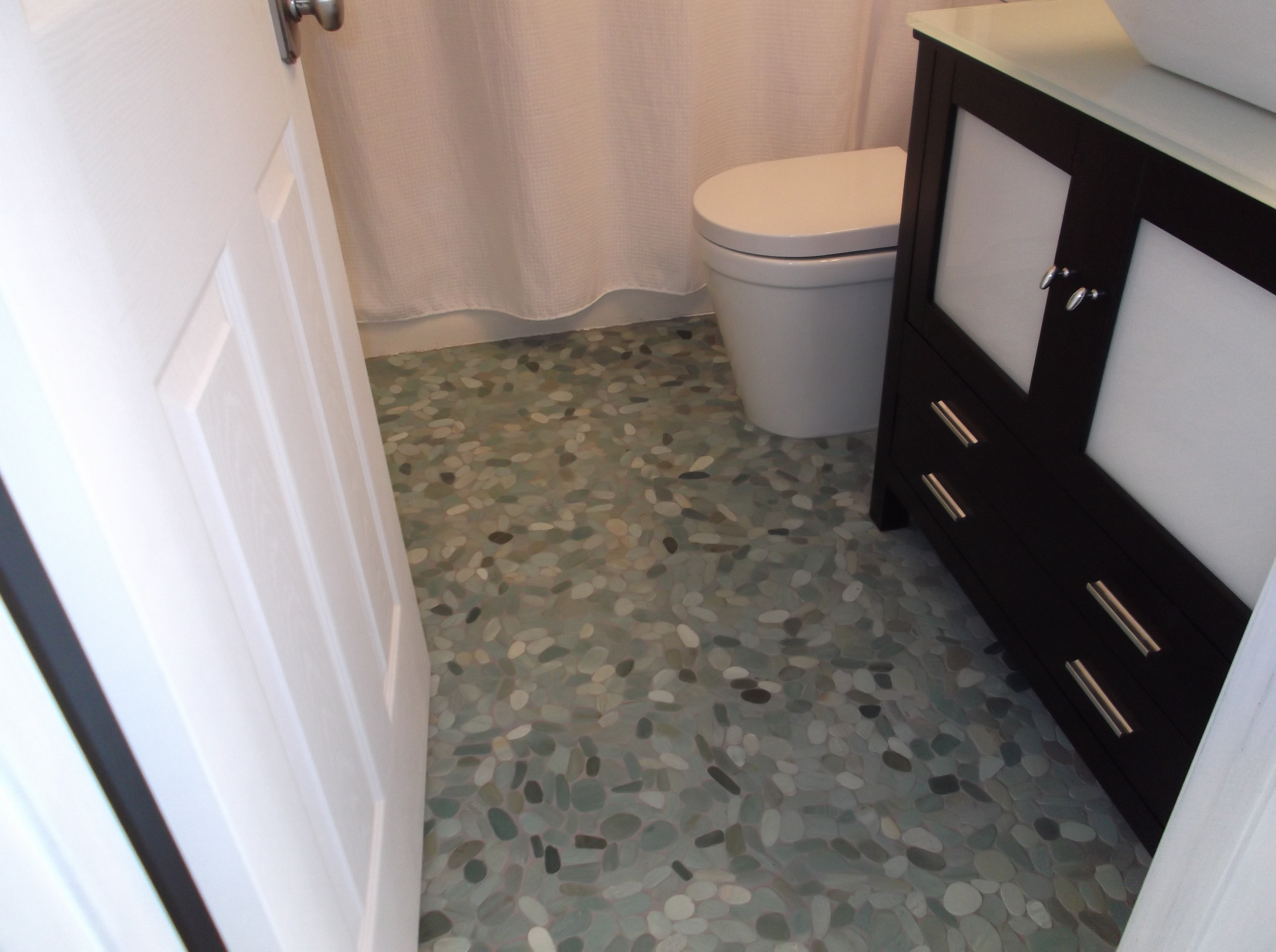 Sliced-Sea-Green-Pebble-Tile-Bathroom-Flooring