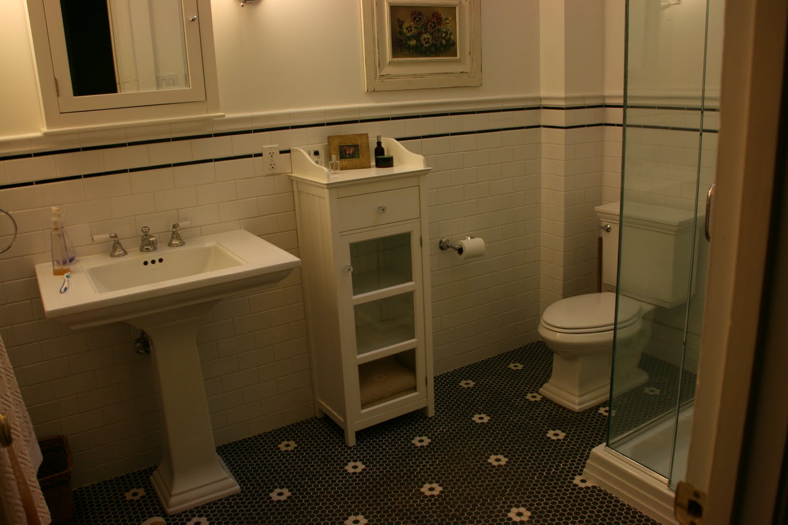 bathroom-entrancing-bathroom-design-ideas-with-black-patterned-porcelain-floor-and-white-brick-ceramic-tile-wall-also-white-pedestal-sink-along-white-cabinet-door-glass-and-white-toilet-as-well-