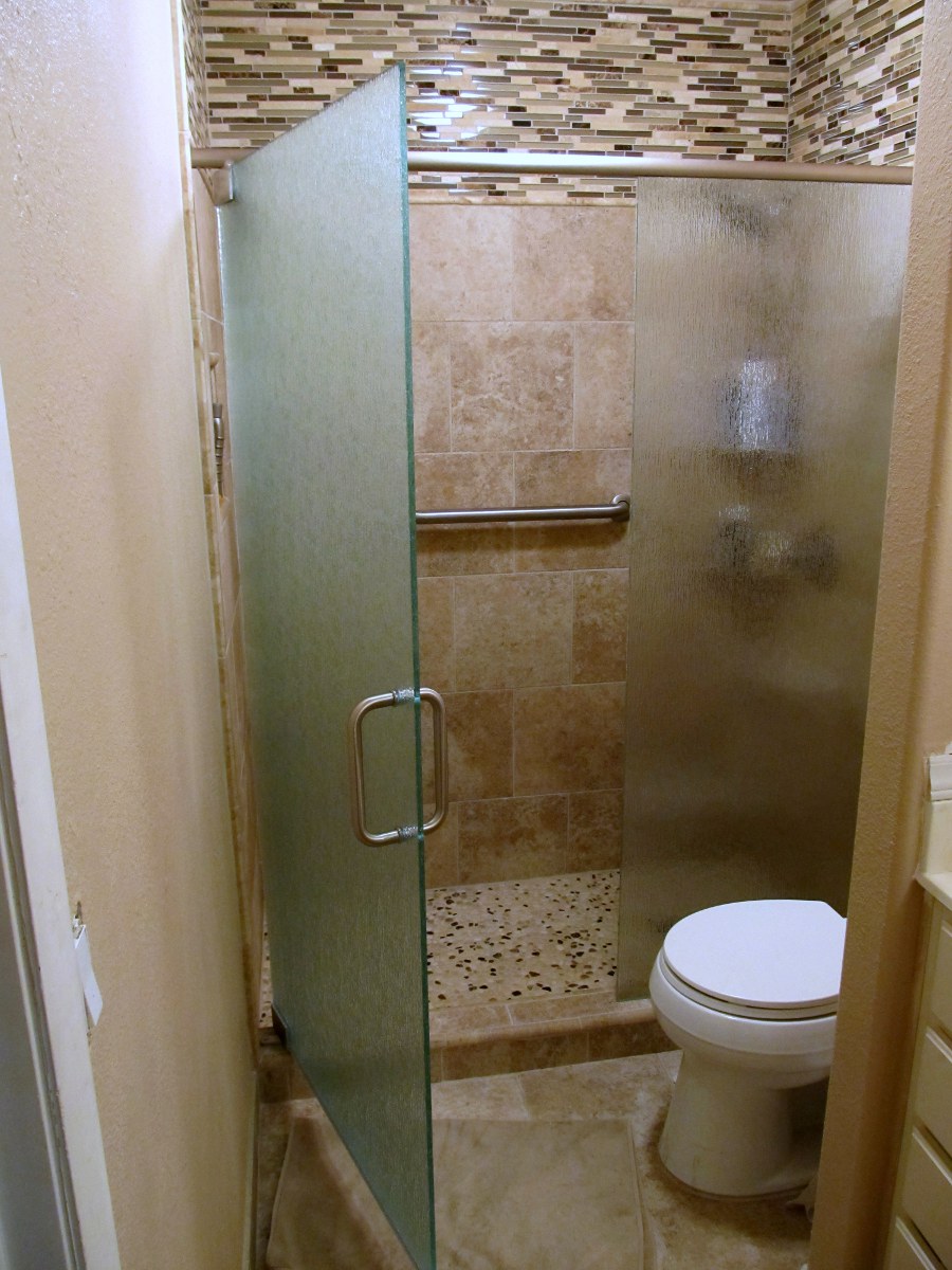 bathroom-excellent-bathroom-decoration-using-dark-brown-glass-tile-bathroom-wall-including-cream-pebble-shower-flooring-and-single-steel-glass-shower-doors-foxy-bathroom-decoration-using-etched-glass