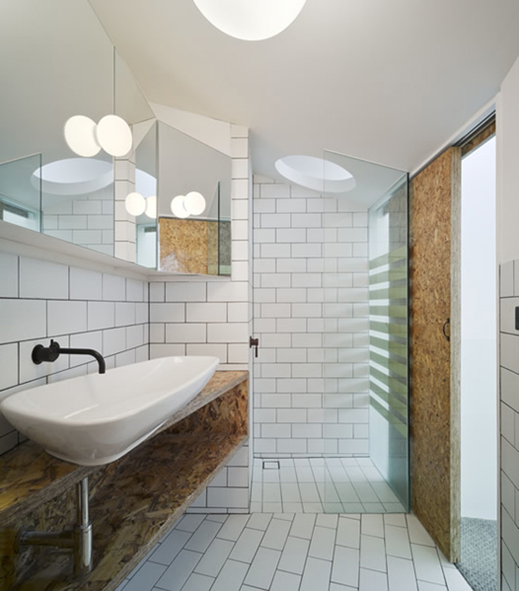 bathroom-unique-small-apartments-bathroom-interior-trend-decoration-with-charming-white-tile-floor-and-glass-shower-also-floating-mirror-and-white-vanity-sink-luxurious-design-small-apartment-ba