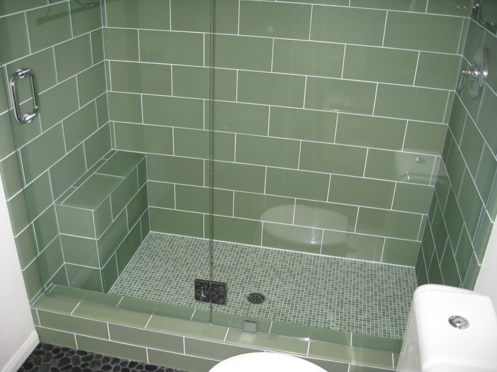 interior-green-themed-bathroom-design-of-small-bathroom-using-green-shower-room-theme-of-green-pebble-floor-combine-with-green-tile-wall-complete-with-glass-door-and-pebble-floor-great-bathroom-decor