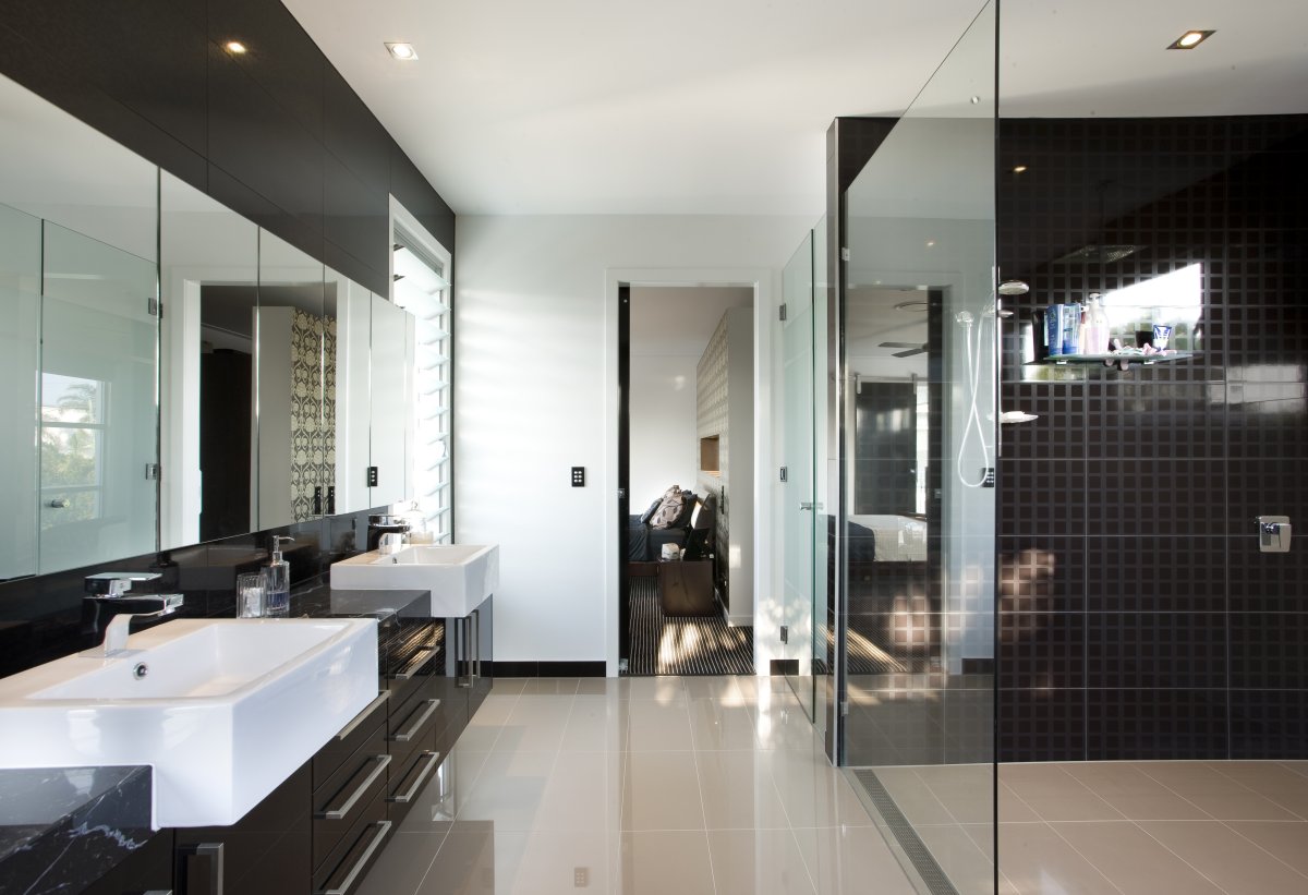 Bathroom-Design-Idea-With-White-Wall-Paint-Color-Combined-Black-Wall-Tiles-And-Cream-Tiled-Floor-Also-Spacious-Shower-And-Elegant-Vanity-Cabinet-And-Rectangular-Vessel-Sinks