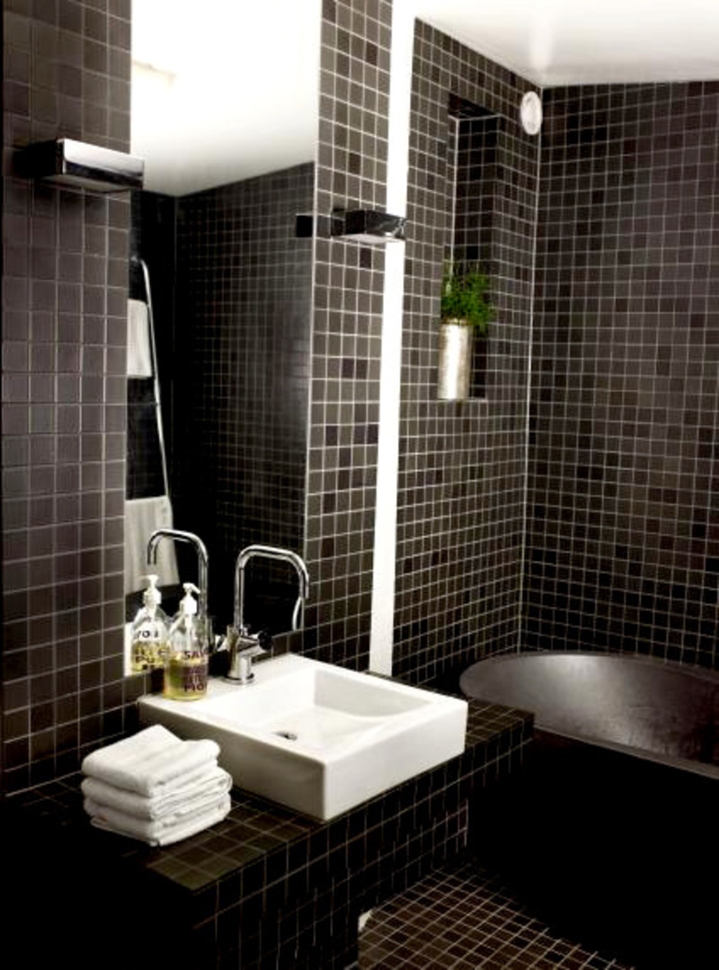 Black bathroom tiles will make the bathroom seem more elegant and luxurious. Because the Black bathroom tiles and have a design model patterned, plain and very interesting. For that we introduce the Black bathroom tiles to you so that you can choose and design the right model. And as you can see now that the Black bathroom tiles will be very interesting if combined with white. With different design black bathroom tiles difference is still attractive because it is very interesting. And if you add furniture, modern accessories, the Black bathroom tiles would look very elegant look