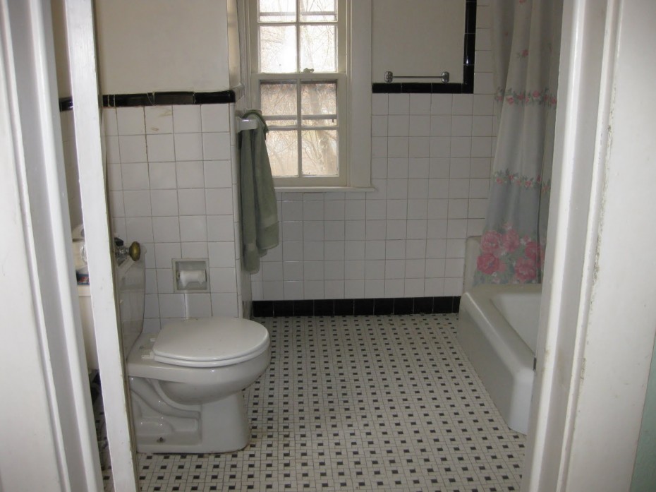 bathroom-minimalist-design-of-small-bathroom-with-a-single-white-toilet-and-bathtub-set-on-tile-flooring-and-white-tile-wall-decorated-with-black-line-smart-bathroom-inspiration-for-