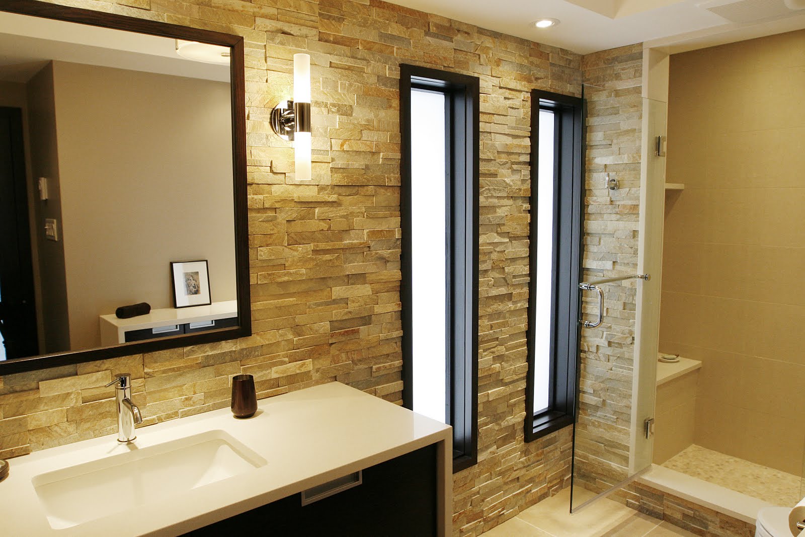 bathroom-rustic-modern-bathroom-design-with-beige-natular-stone-brick-wall-complete-with-shower-room-and-bathroom-cabinet-with-white-washbasin-plus-rectangular-mirror-and-wall-light-beige-bathroom-de