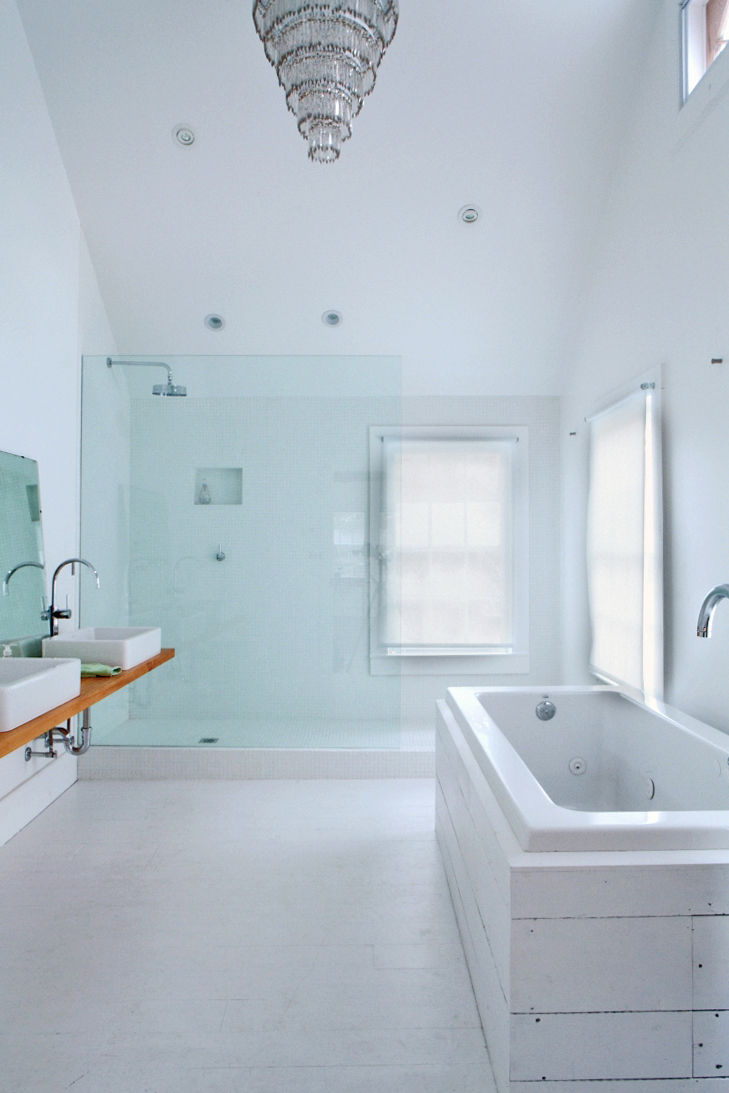 floating_farmhouse_master_bathroom_glass_chandelier_bathtub