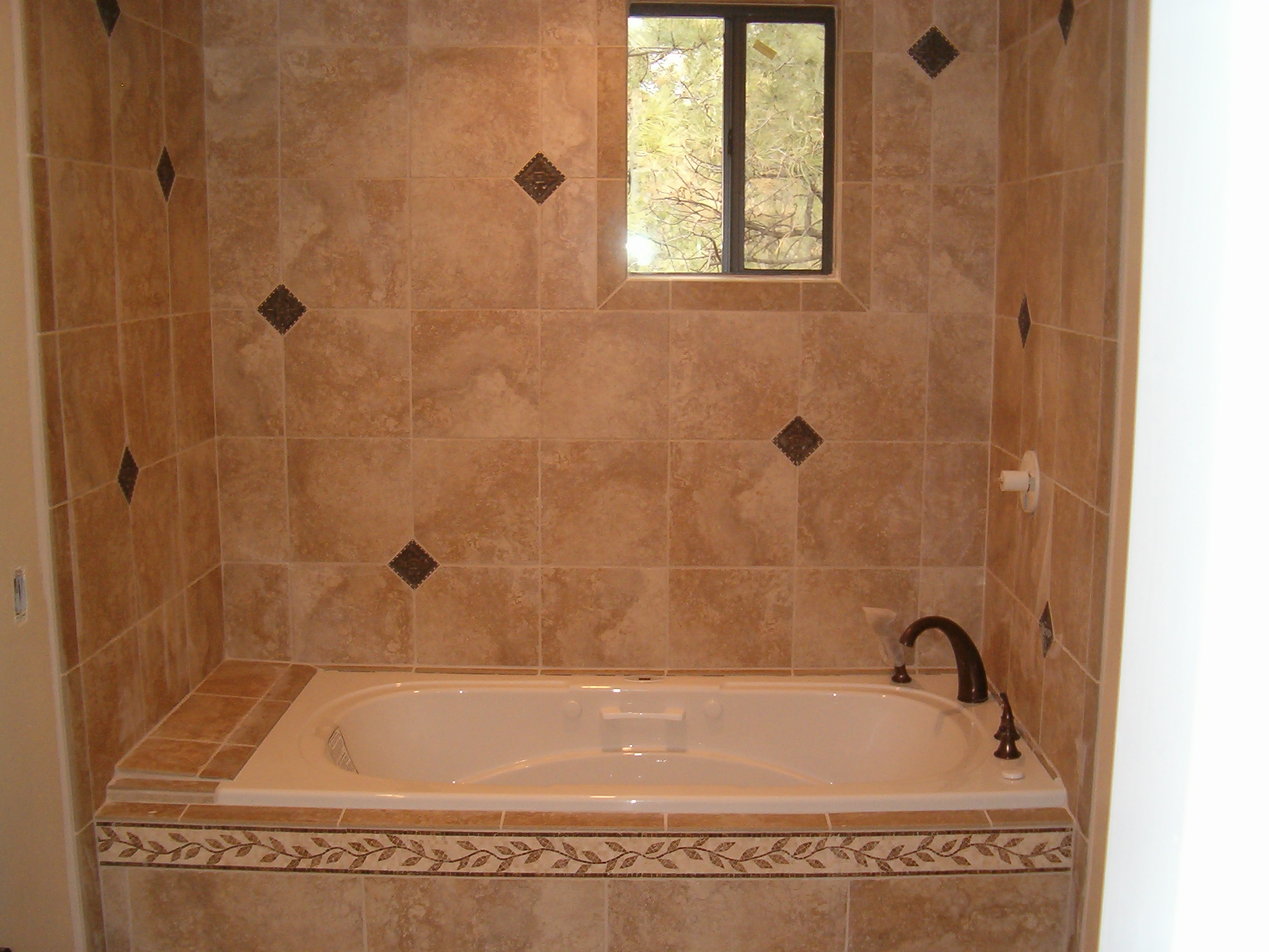 tiling-a-bathroom-wall-on-bathroom-tub-diamond-tile-wall