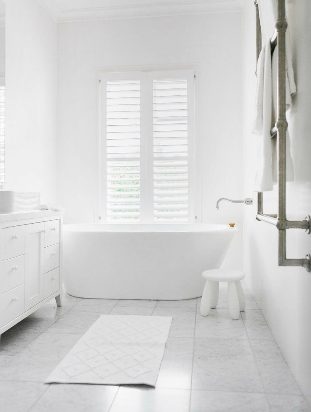 white-bathroom-paint-colors-ideas-for-cottage-style-bathroom-with-free-standing-bath-and-concret-floor-and-white-shutter